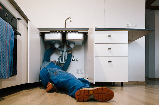 Professional Plumbing technician working in Evergreen, CO